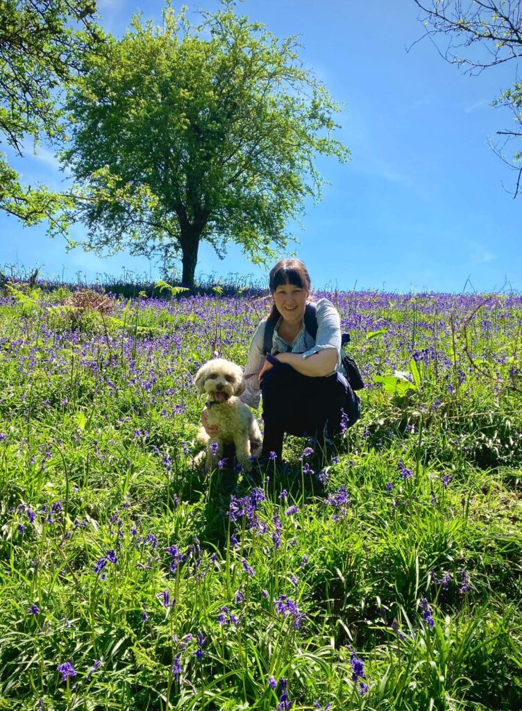 Claire walking dog on Dartmoor